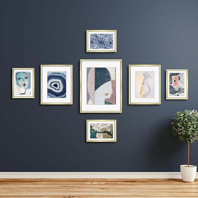 Frametory, Gold Aluminum Picture Frame with Removable Mat - Set of 7 Includes Four 5x7, Two 8x10, One 11x14 - Real Glass Front - Simple Gallery Wall Frames for Art Prints and Posters
