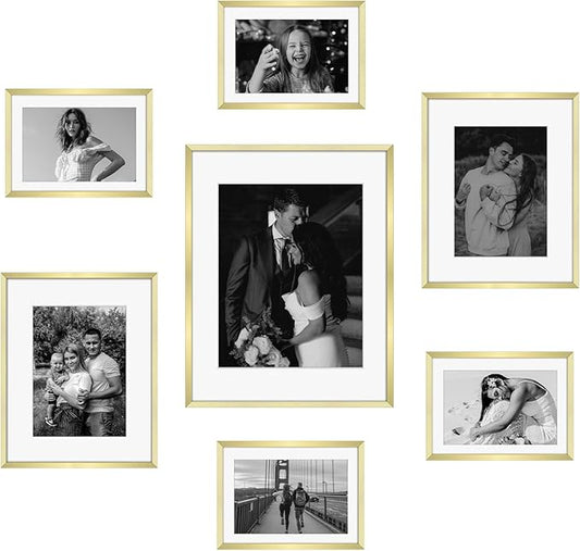 Frametory, Gold Aluminum Picture Frame with Removable Mat - Set of 7 Includes Four 5x7, Two 8x10, One 11x14 - Real Glass Front - Simple Gallery Wall Frames for Art Prints and Posters