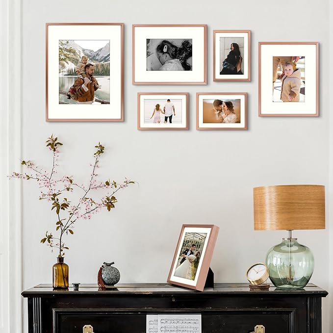 Frametory, Aluminum Picture Frames Set of 7 - Rose Gold Gallery Wall Kit - Displays One 11x14, Two 8x10, and Four 5x7 inch Photos for Home Decoration
