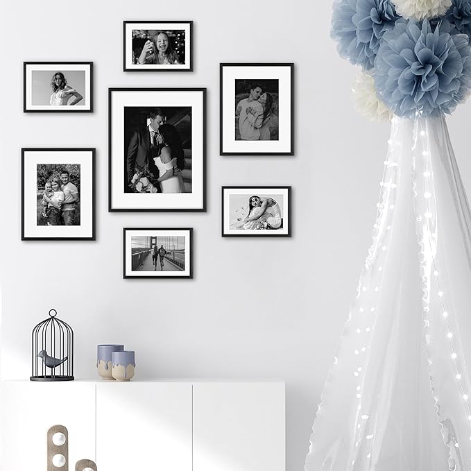 Frametory, Black Aluminum Picture Frame with Removable Mat - Set of 7 Includes Four 5x7, Two 8x10, One 11x14 - Real Glass Front - Simple Gallery Wall Frames for Art Prints and Posters